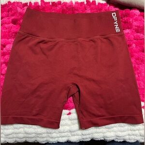 Women's DFYNE red shorts worn once.  size XS    Price= $50.